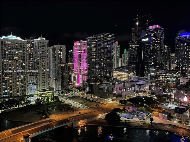 property's view of city featuring a water view