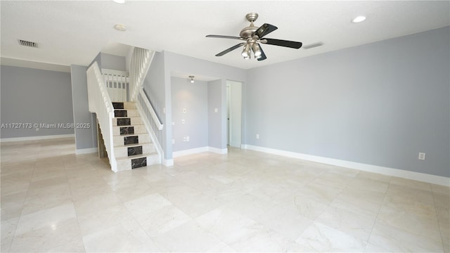 spare room featuring ceiling fan