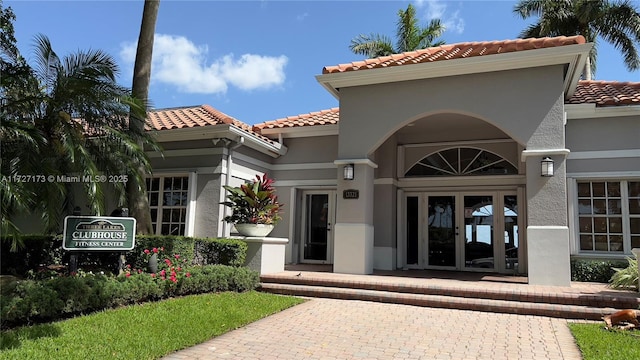 view of exterior entry with french doors