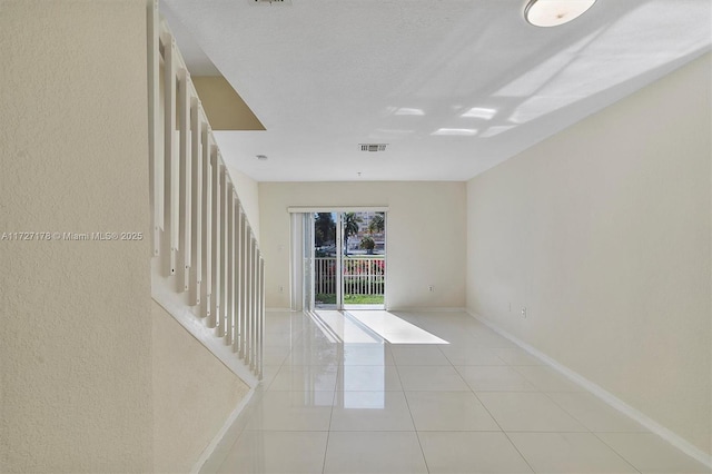 view of tiled empty room