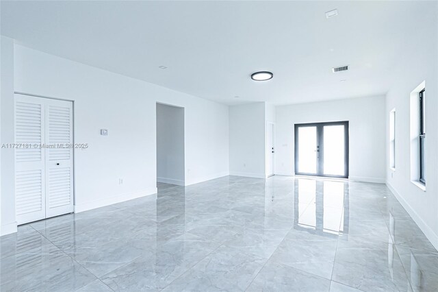 empty room with french doors