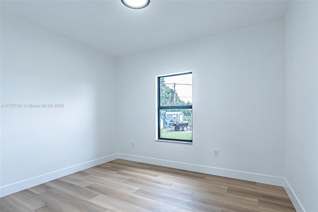 empty room with light wood-type flooring