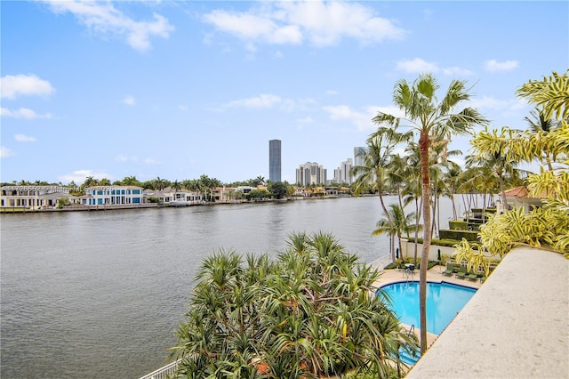 view of pool featuring a water view