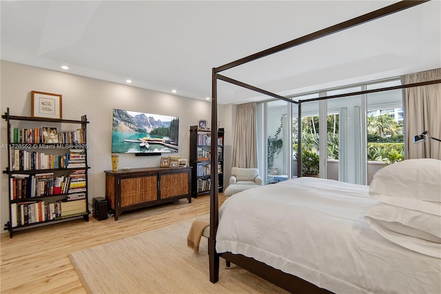 bedroom featuring hardwood / wood-style flooring