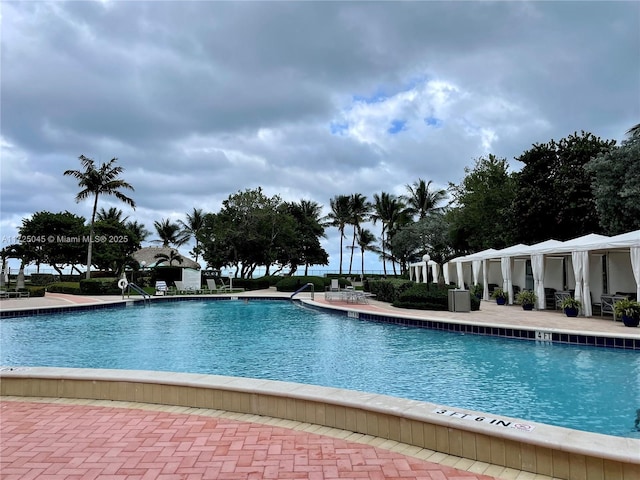 community pool featuring a patio area