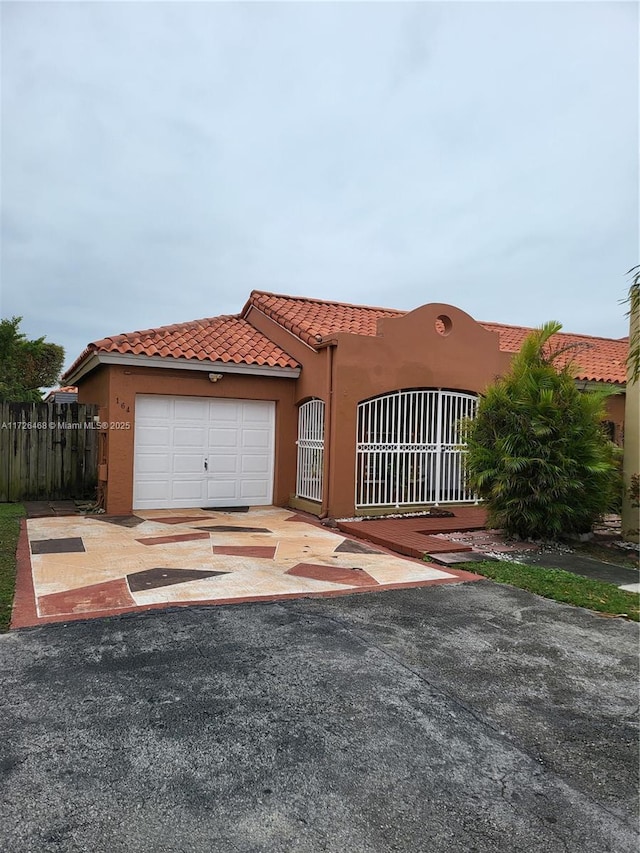 view of front of property featuring a garage