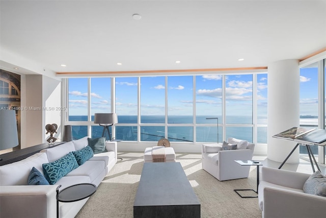 100 S Pointe Dr Unit 3203, Miami Beach, FL 33139 - living area featuring a water view, light colored carpet, and recessed lighting