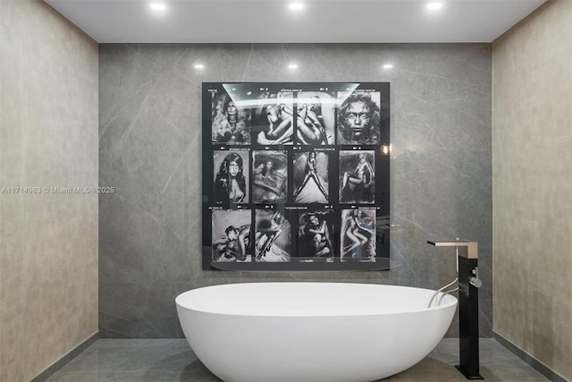 100 S Pointe Dr Unit 3203, Miami Beach, FL 33139 - full bathroom featuring tile walls, a freestanding tub, and recessed lighting