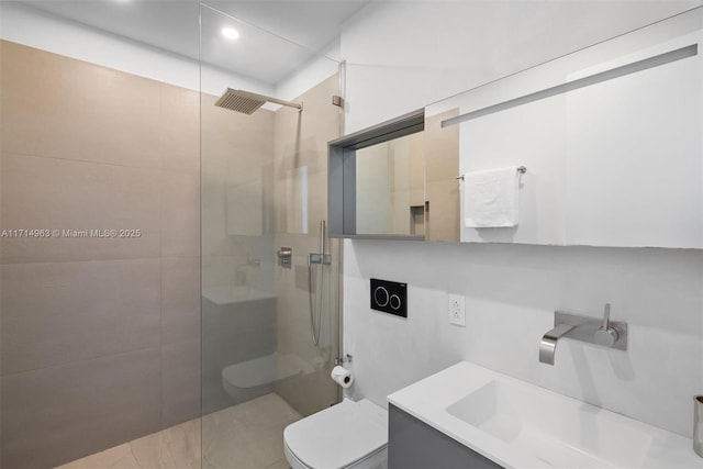100 S Pointe Dr Unit 3203, Miami Beach, FL 33139 - bathroom featuring toilet, a walk in shower, vanity, and recessed lighting
