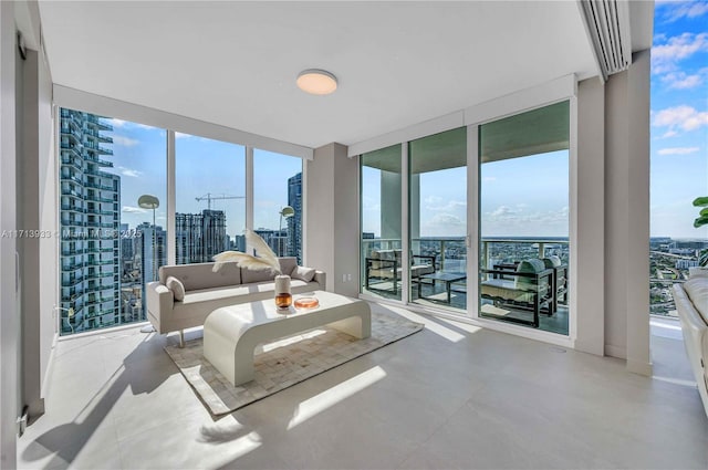 living room with a wall of windows