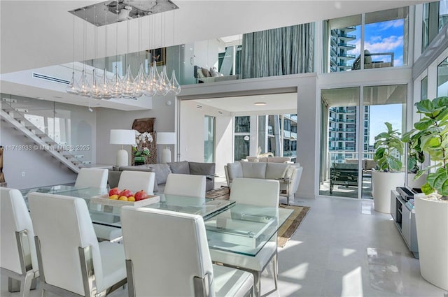 dining space with a high ceiling