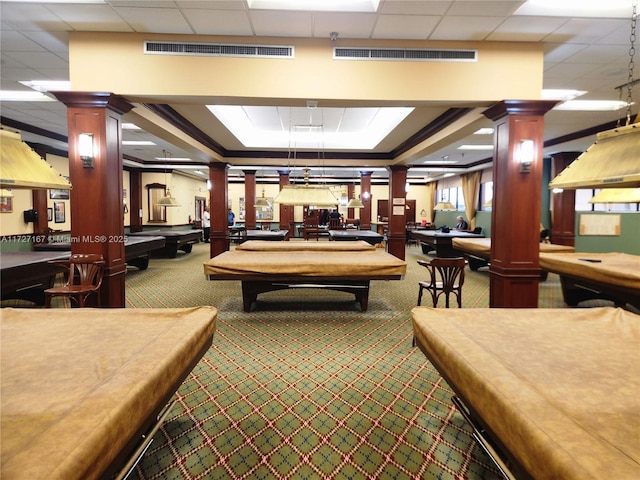 playroom featuring decorative columns, a raised ceiling, pool table, visible vents, and carpet flooring