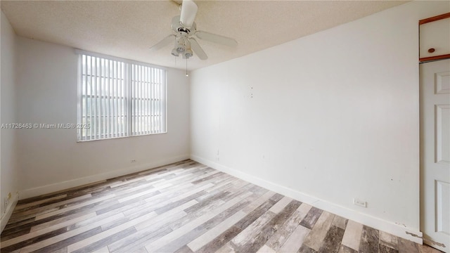 unfurnished room featuring a textured ceiling, ceiling fan, and light hardwood / wood-style floors