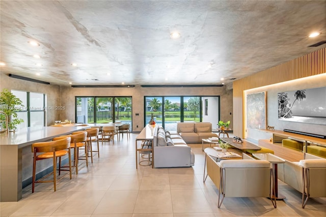 living room with light tile patterned floors