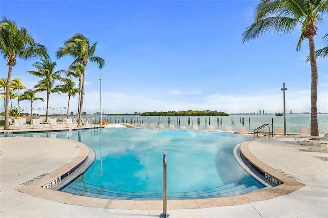 community pool featuring a patio area