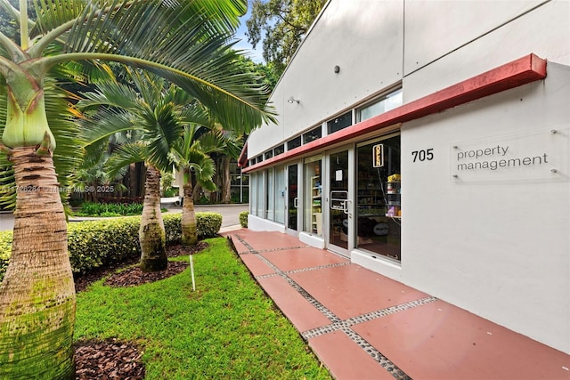 exterior space with stucco siding