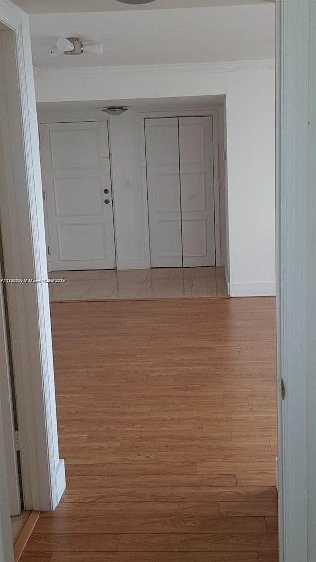 hallway with light wood-type flooring