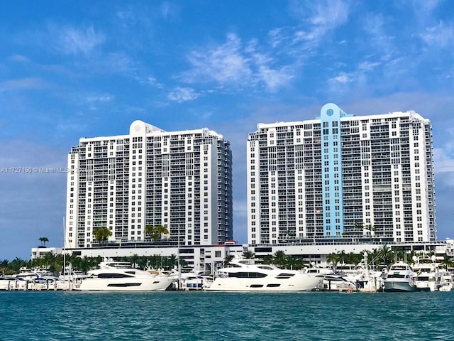 view of pool with a water view