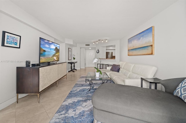 living room featuring light tile patterned floors