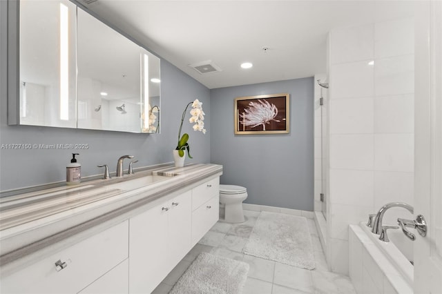 full bathroom featuring tile patterned floors, toilet, vanity, and independent shower and bath