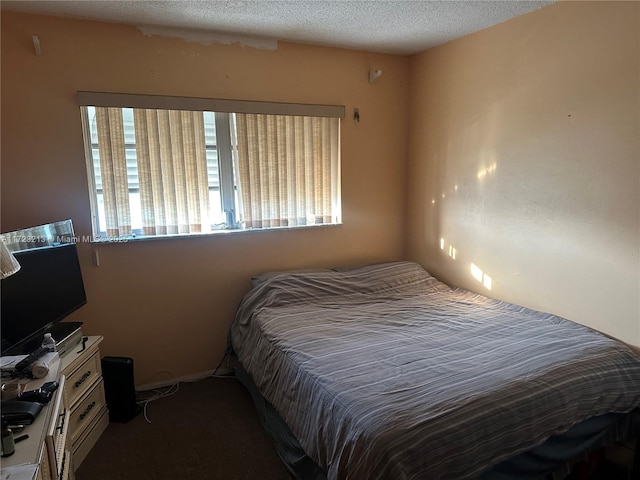 bedroom with a textured ceiling