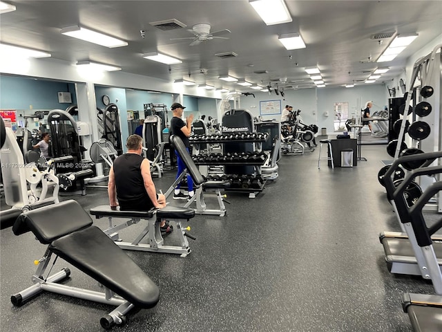 workout area featuring ceiling fan