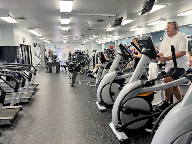 workout area with ceiling fan