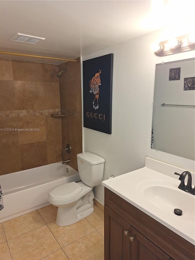 full bathroom featuring visible vents, shower / bathing tub combination, toilet, vanity, and tile patterned floors