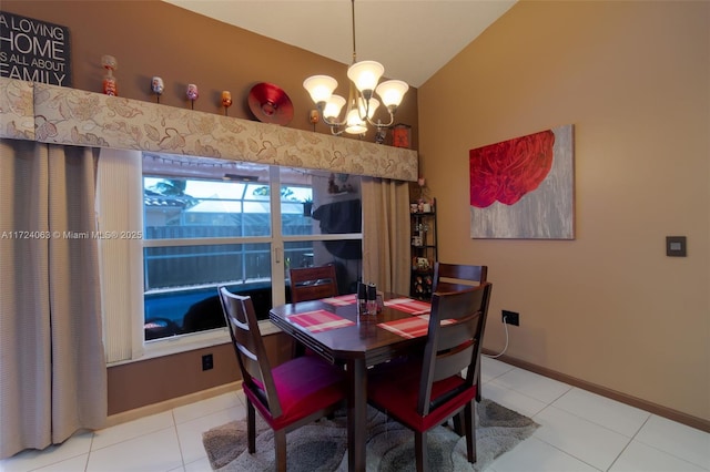 dining room with high vaulted ceiling, tile patterned flooring, and an inviting chandelier