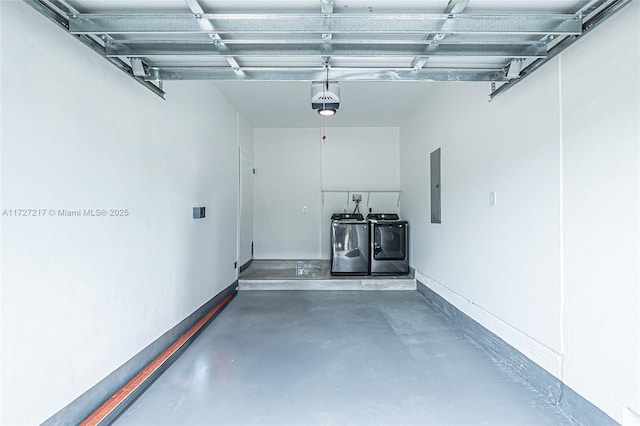 garage with electric panel, baseboards, independent washer and dryer, and a garage door opener