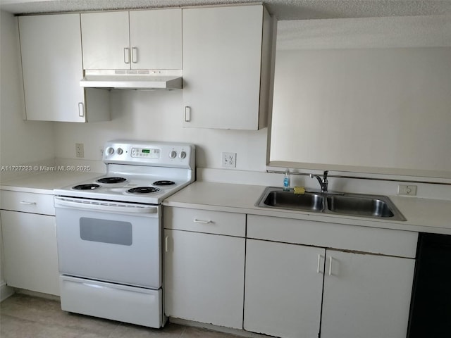 kitchen with light tile patterned flooring, sink, white cabinetry, and white range with electric cooktop