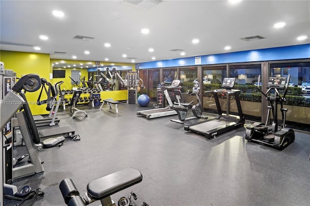gym featuring recessed lighting and visible vents