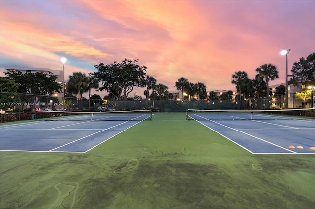 view of sport court with community basketball court and fence