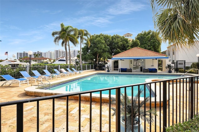 view of pool featuring a patio