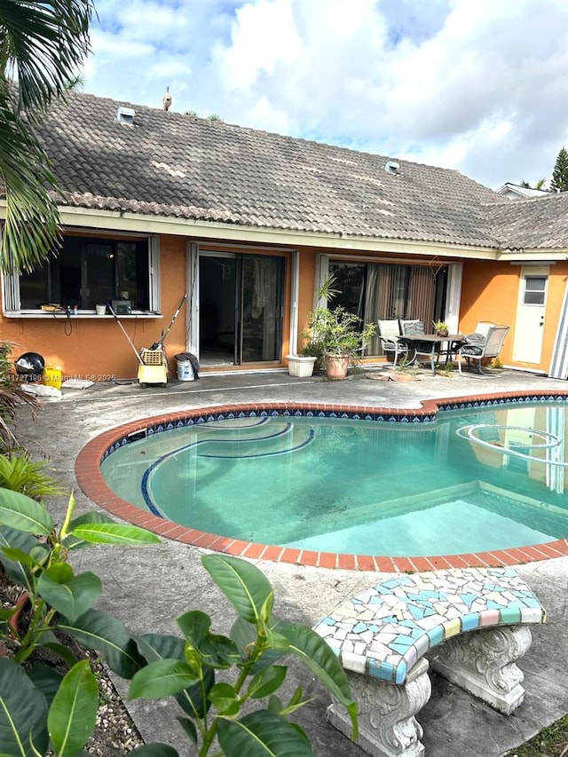 view of pool with a patio area