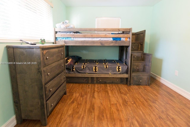 bedroom featuring dark hardwood / wood-style floors