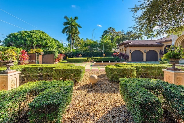 view of yard featuring a garage