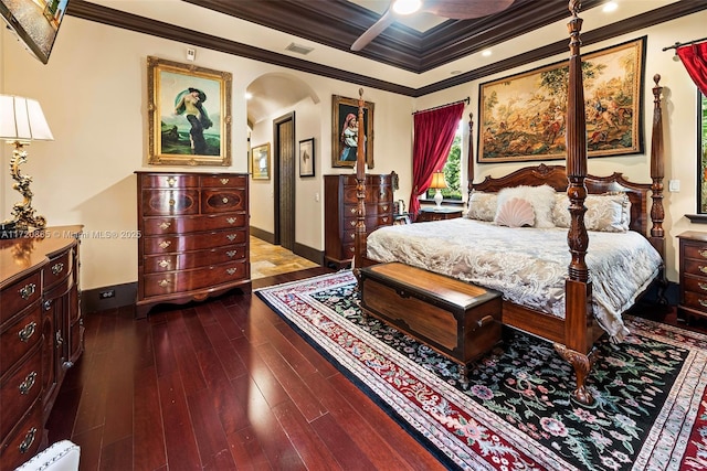 bedroom with ceiling fan, hardwood / wood-style flooring, and ornamental molding