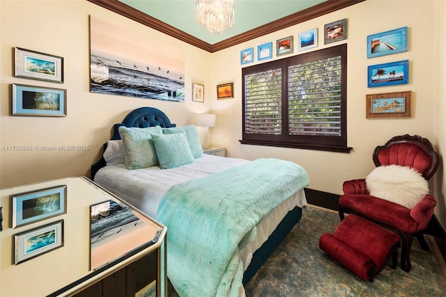 bedroom featuring an inviting chandelier and ornamental molding