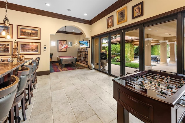 playroom with billiards, plenty of natural light, and crown molding