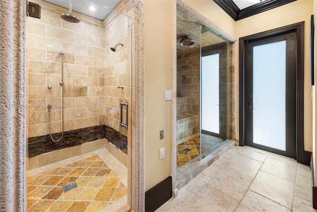 bathroom with tiled shower and ornamental molding