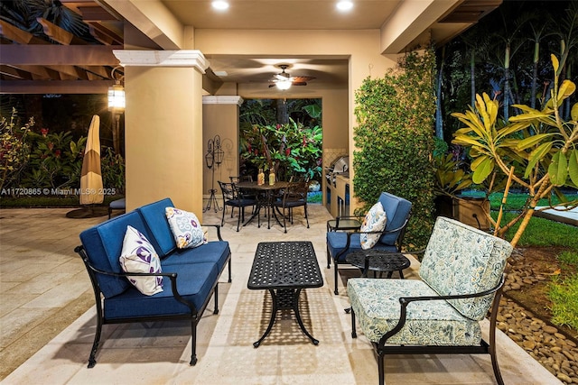 view of patio with ceiling fan and outdoor lounge area