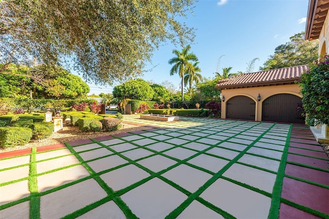 view of patio / terrace featuring a garage