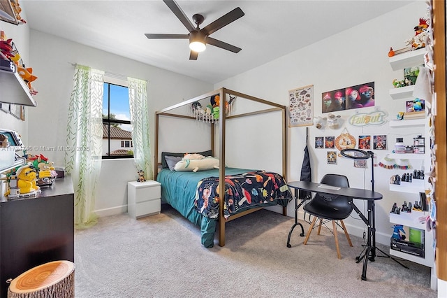 bedroom featuring ceiling fan and carpet