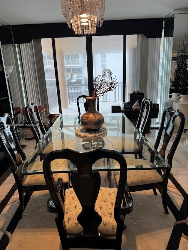 tiled dining room featuring a chandelier