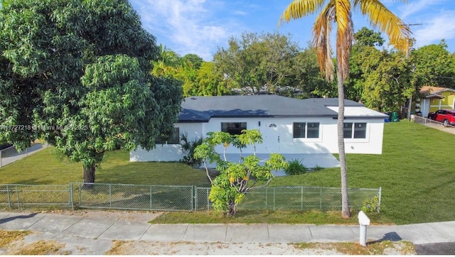 view of side of property featuring a yard