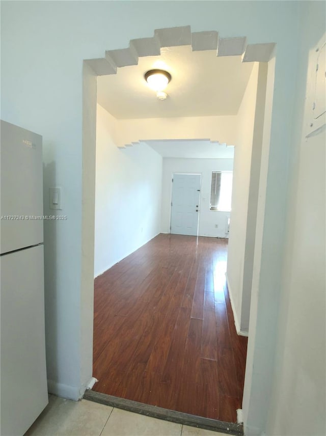 corridor featuring hardwood / wood-style flooring