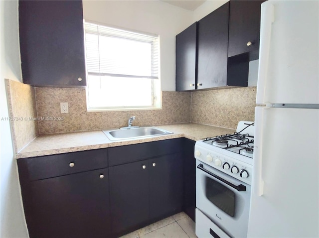 kitchen featuring decorative backsplash, sink, white appliances, and light tile patterned flooring