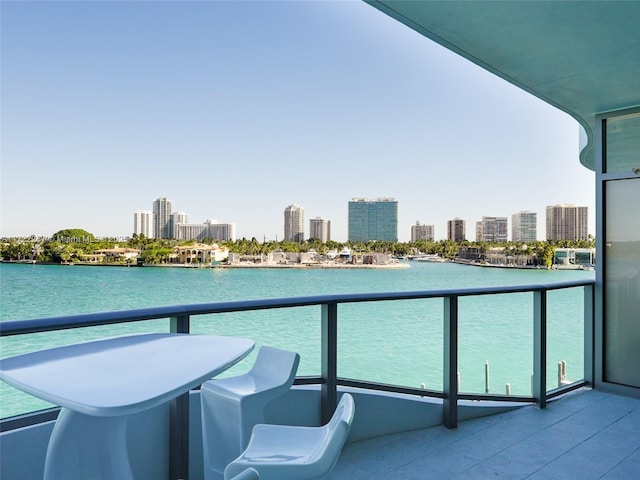 balcony featuring a water view