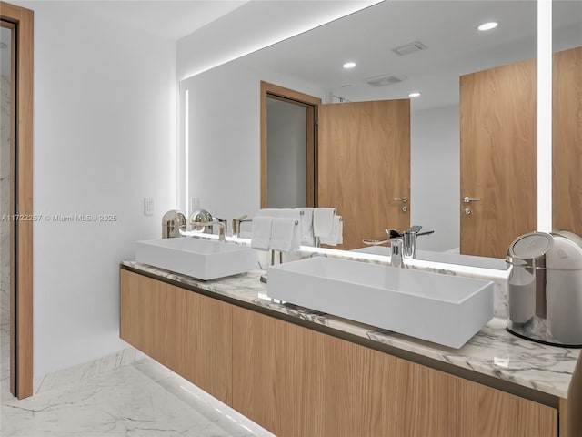 1135 103rd St Unit 502, Bay Harbor Islands, FL 33154 - full bathroom featuring marble look tiles, recessed lighting, and double vanity